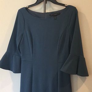Form fitting dress with bell sleeve